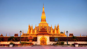 Pha That Luang stupa at sunset in Vientiane, Laos