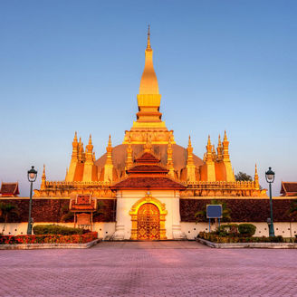 Pha That Luang stupa at sunset in Vientiane, Laos