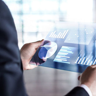 A person is looking at the sustainability reporting on a tablet.