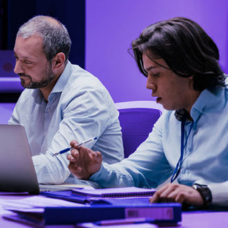 People are working in the meeting room