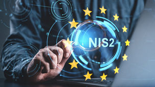 NIS2 specialist working on pc