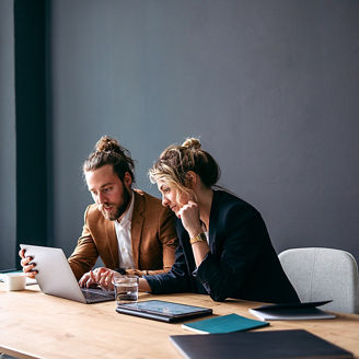 Employees with laptop