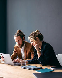 Employees with laptop