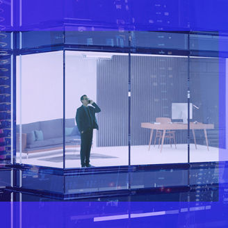 Man looking out in business building