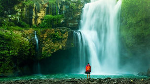 Person at waterfall