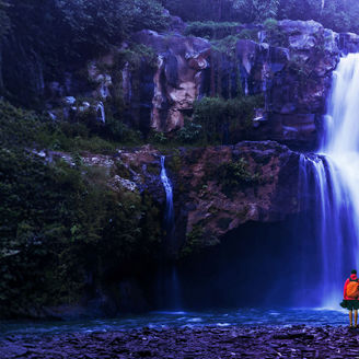Person at waterfall
