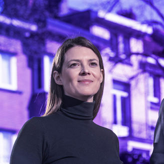 2 employees of KPMG in Belgium looking far away