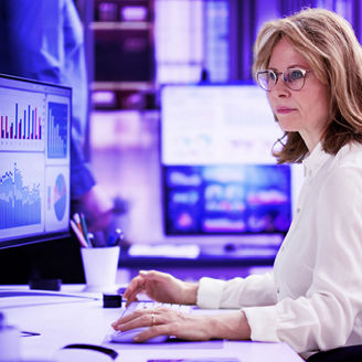 Businesswomen looking at dashboards
