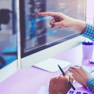 finger pointing out at a computer screen