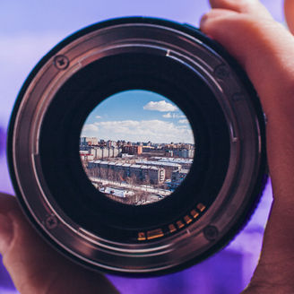 view of a city through a lens