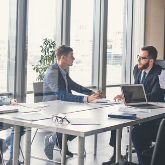 Technology consultants discussing SAP migration