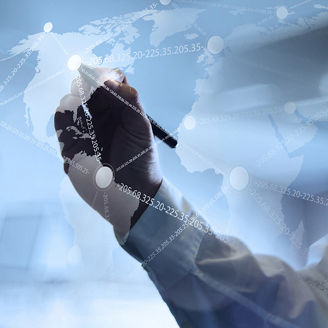 Man marking coordinates on global map