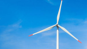 Windmill in front of blue sky