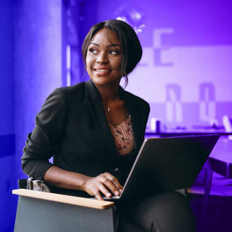 woman-behind-computer-looking-away