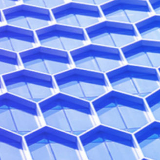 An abstract hexagonal geometric pattern fills the frame as a repeating architectural-style background.