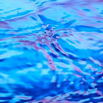 Girl smiling in a group meeting