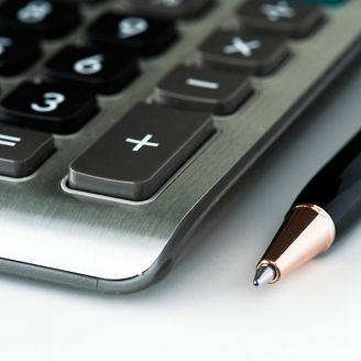 CLoseup of calculator with pen