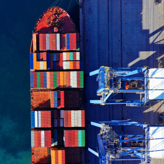 Aerial view of cargo ship at port