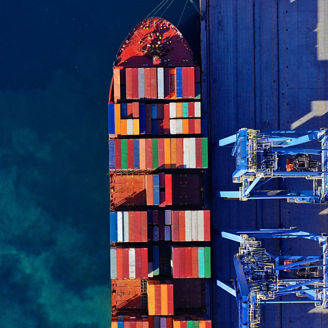 Aerial view of cargo ship at port