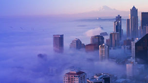 Aerial view of skyscraper in cloud