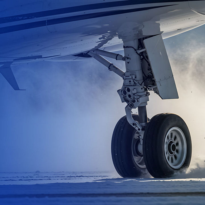Aircraft tire landing on snowy runway