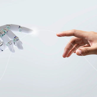 Human and robot hand together in harmony