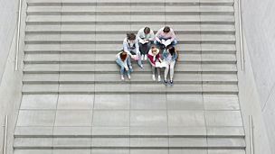 Students sitting on stairs