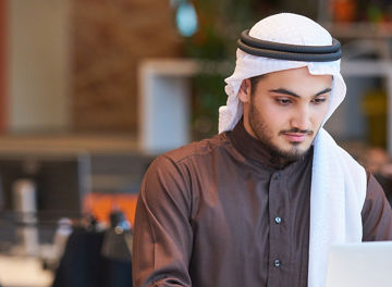 Picture of an Arab man working in corporate