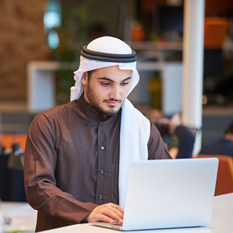 Picture of an Arab man working in corporate