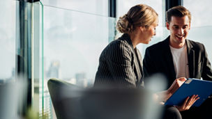 Corporate business team meeting discussion and startup concept. Coworking team meeting. Group of two businesspeople working with new startup project in modern office.