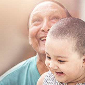 Baby and dad smiling