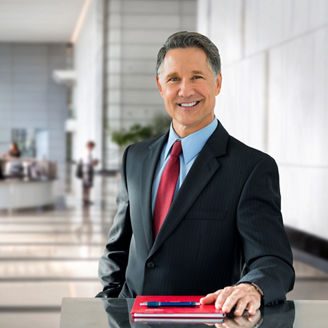 Corporate banking advisor, professional investment manager, businessman, greeting with welcoming smile in building lobby