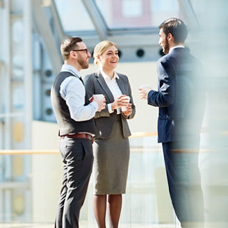 Business Colleagues Chatting at Coffee Break