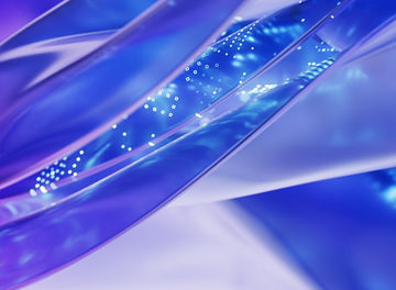 Abstract blue and purple wave pattern with glowing dots.