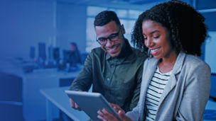 Man and woman with Ipad