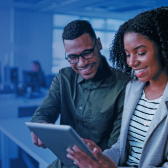 Man and woman with Ipad
