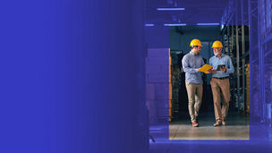 men walking in warehouse