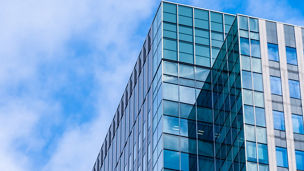 Beautiful architecture skyscraper office business building with glass window shape