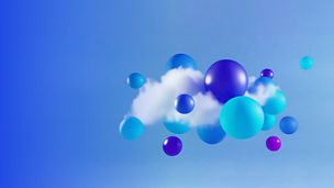 Blue and purple balloons amongst a cloud