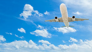 bottom view of aeroplane in sky