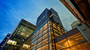 Bottom view of glass office building