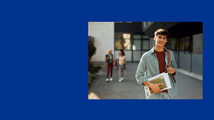 Boy holding books