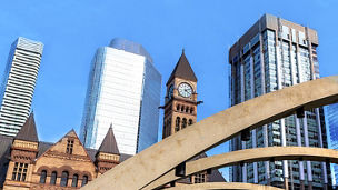 Buildings in america against a bridge