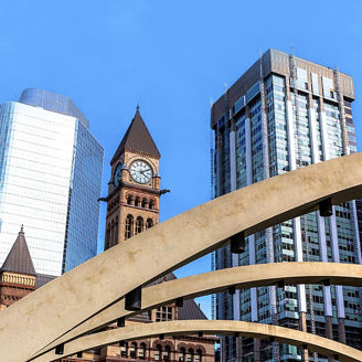 Buildings in america against a bridge