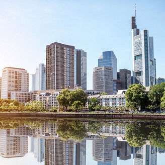 Buildings in front of a river