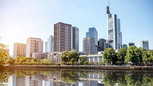 View on the financial district with Main river in Frankfurt city, Germany