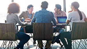 Discussion, planning and team of business people in the office boardroom brainstorming for a project. Collaboration, professional and group of employees in a creative meeting in the modern workplace.