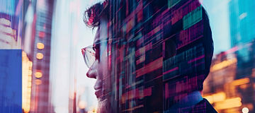 Business leader overlooking a digital cityscape