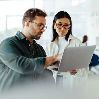 business-leaders-looking-at-laptop