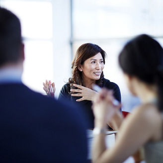 Business people talking in meeting